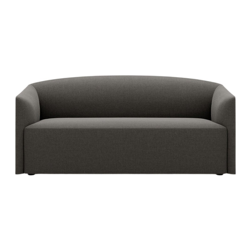 Modern dark gray sofa with a minimalist design and smooth, curved lines. Perfect for contemporary living spaces.