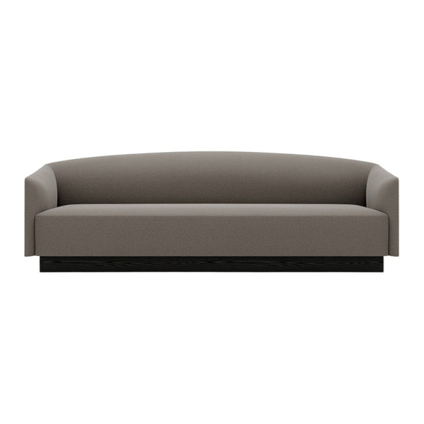Modern gray sofa with sleek lines and a minimalist design, featuring a solid black base. Perfect for contemporary interiors.