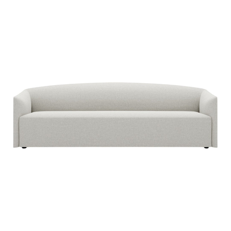 Light gray upholstered sofa with a smooth, minimalist design and rounded backrest. Ideal for modern interiors.