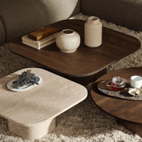 "Set of stylish square coffee tables in warm beige and rich walnut, showcasing smooth finishes and elegant silhouettes."