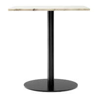 "Black metal base with a sleek white marble top, featuring subtle natural veining. Elegant and modern design."