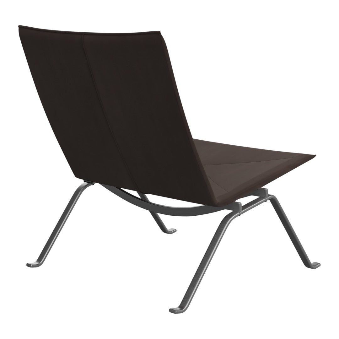 Modern black lounge chair with sleek chrome legs, featuring a minimalist design and smooth upholstery.
