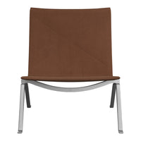 Brown minimalist lounge chair with a sleek silver frame and simple geometric design. Perfect for modern decor.