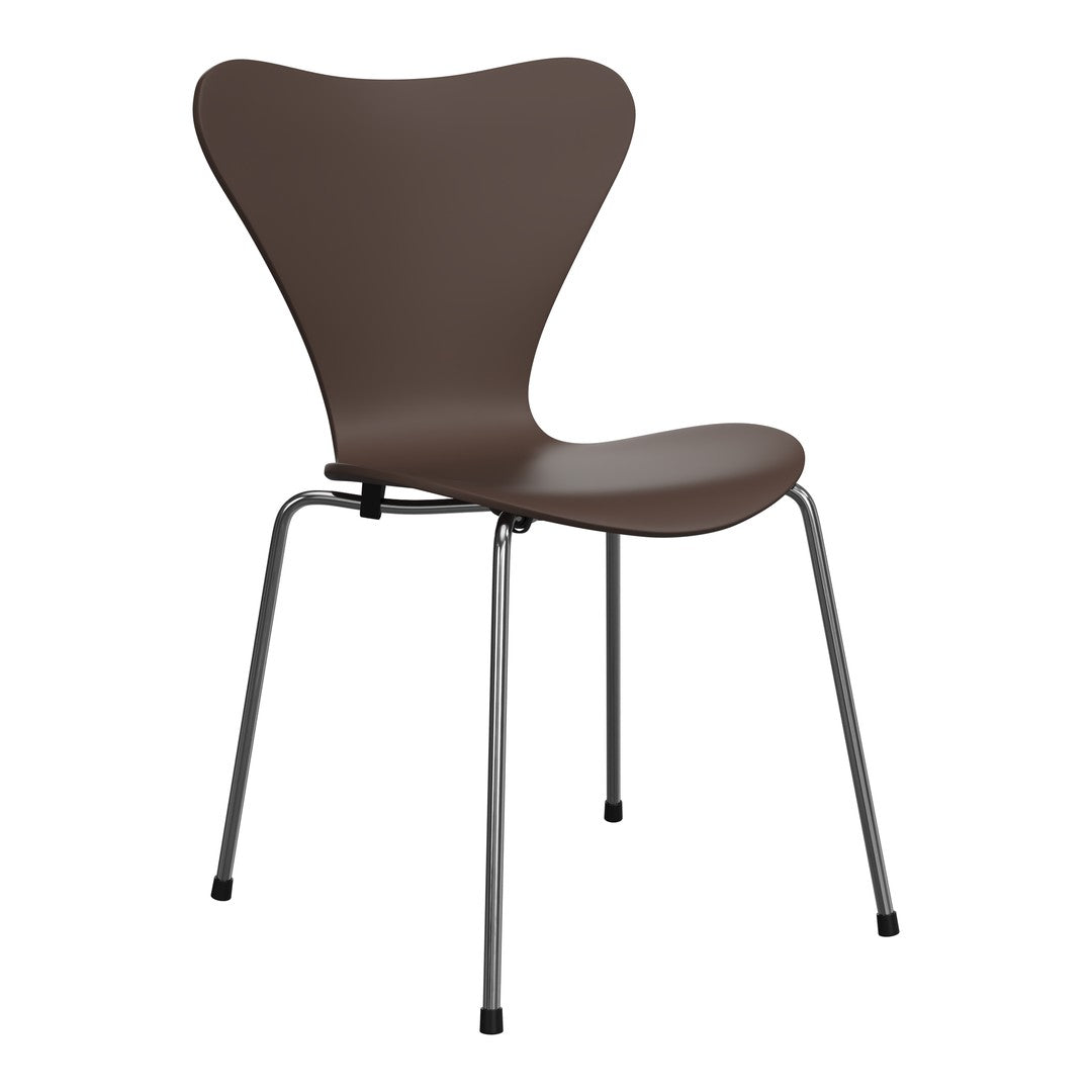 Brown butterfly chair with smooth molded seat and sleek chrome legs, perfect for modern décor.