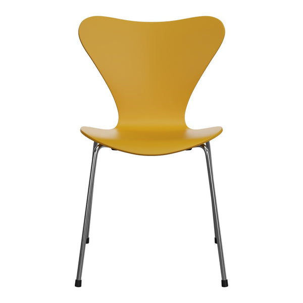 Yellow butterfly chair with a smooth, modern design and sleek metal legs. Perfect for a vibrant touch in any space.