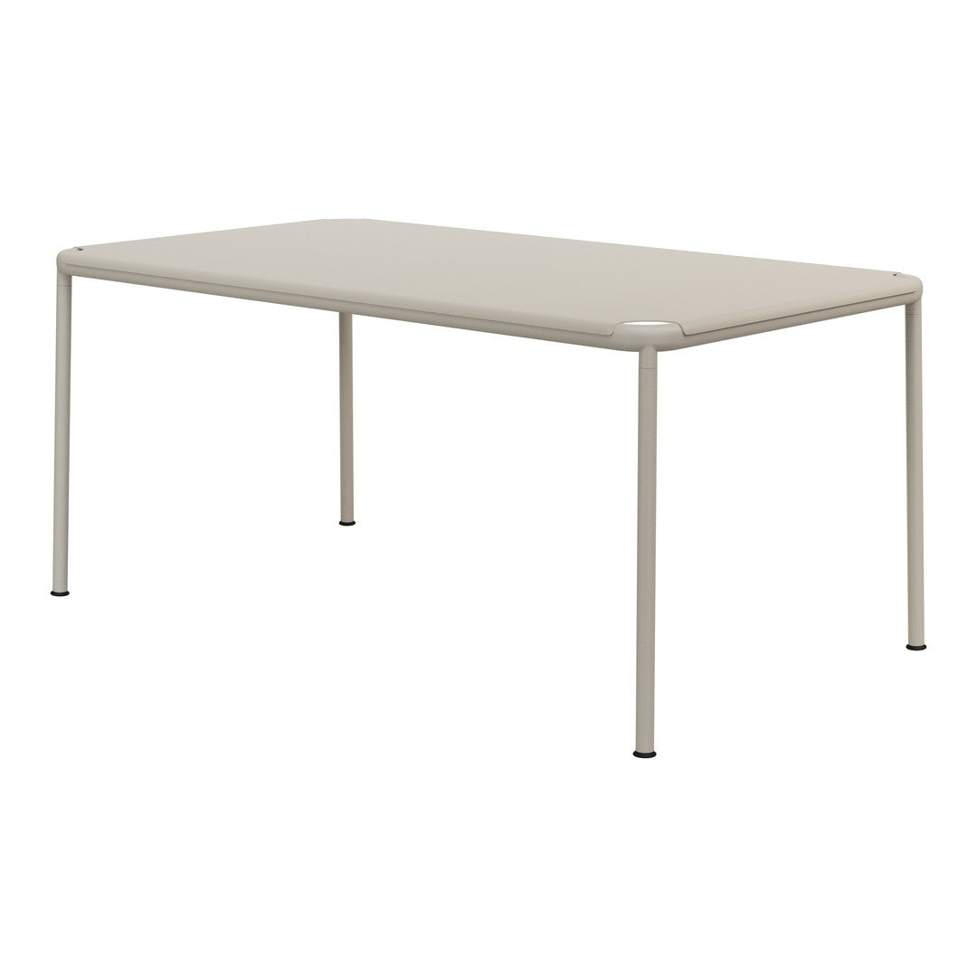 Rectangular table in a soft beige color with a sleek, minimalistic design and smooth, solid surface.