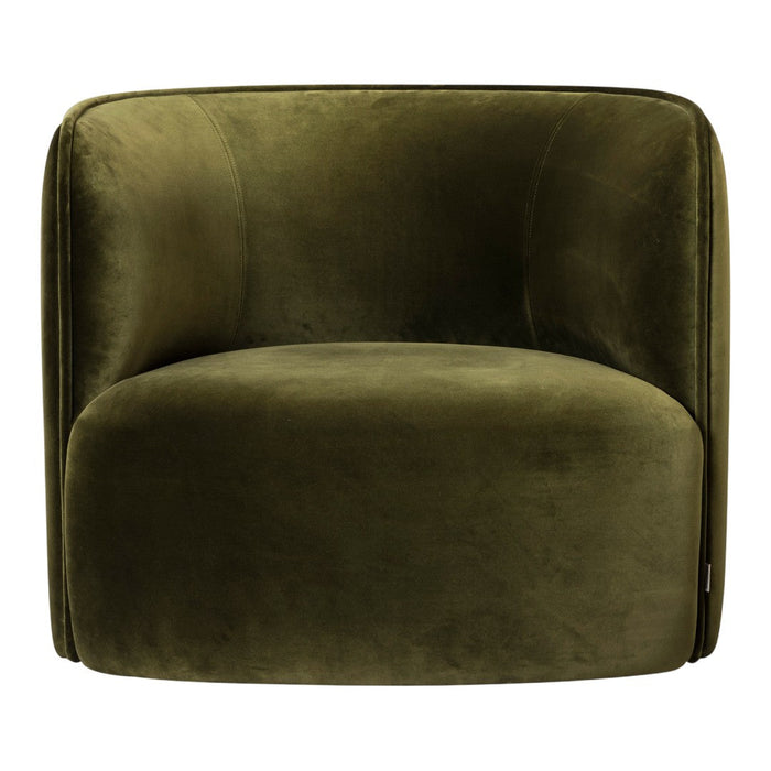 Green velvet barrel chair with a smooth, soft texture and rounded design, perfect for modern interiors.