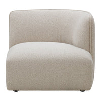 Beige chair with a textured, soft fabric and curved design, perfect for modern interiors.