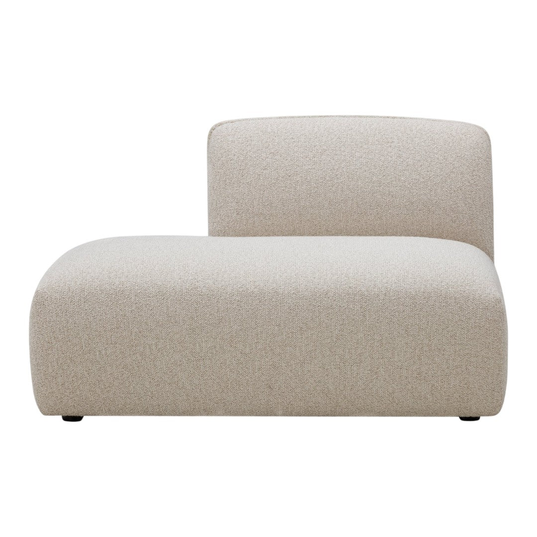 Light beige chaise lounge with a smooth, textured fabric and minimalist design, perfect for modern interiors.