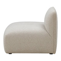 Light beige curved sofa with a textured, soft fabric, featuring a minimalist design and rounded backrest.