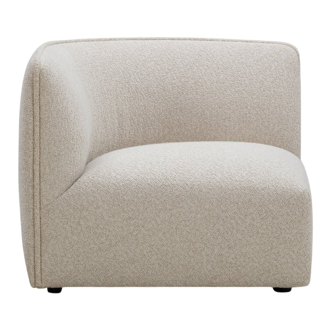 Beige curved accent chair with a textured, soft fabric pattern, perfect for modern home decor.