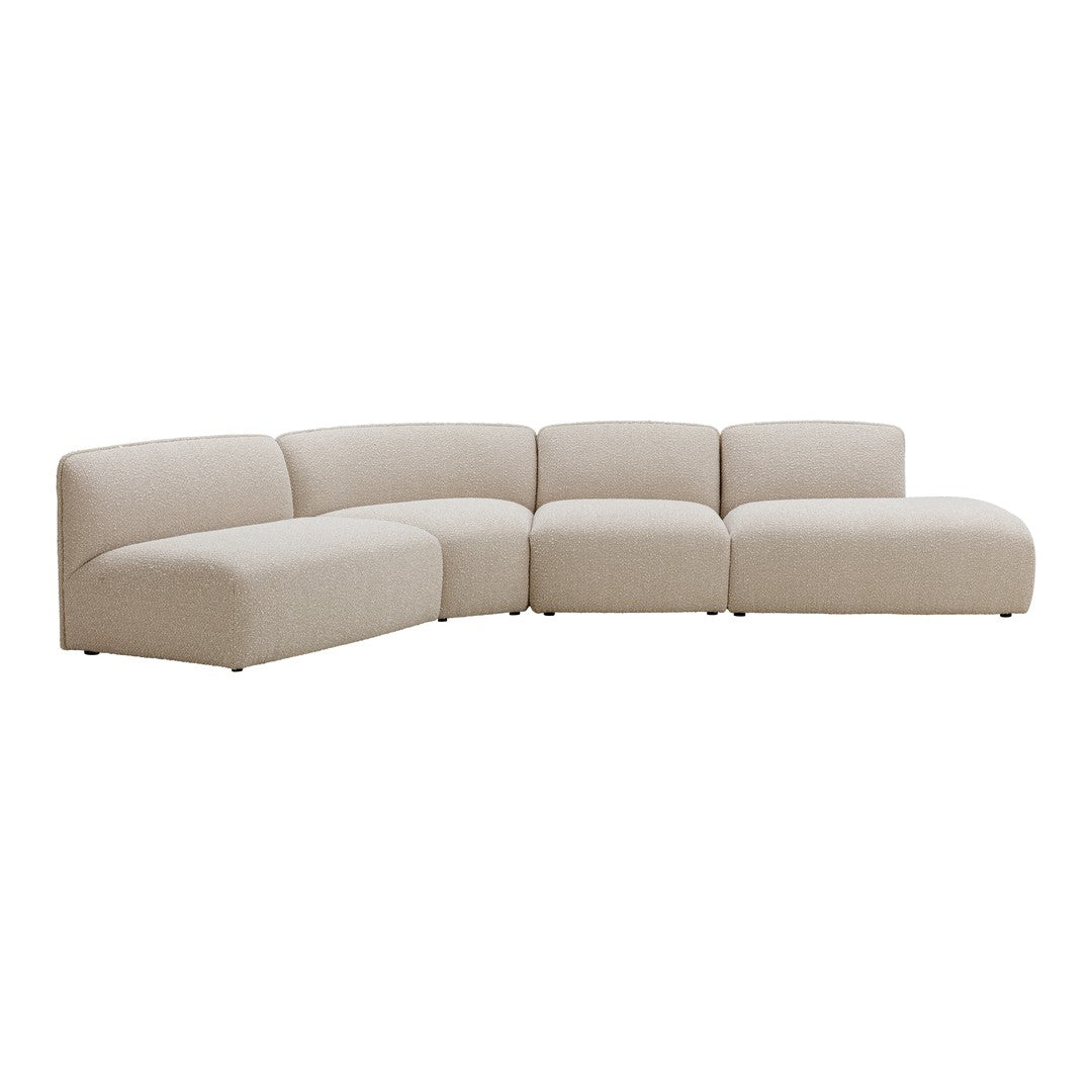 Beige curved sectional sofa with smooth, seamless upholstery and modern design. Ideal for contemporary living spaces.
