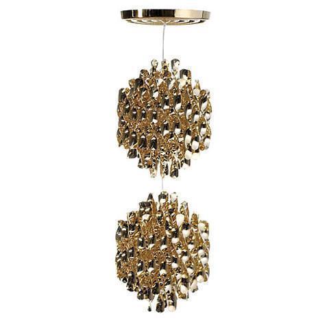 Gold pendant light with an intricate, textured pattern featuring geometric shapes and reflective elements.