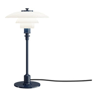 Navy blue lamp with layered white shades and a sleek black cord. Elegant design for modern decor.