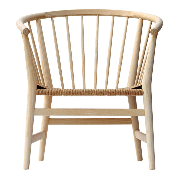 Natural wood chair with a light beige finish and simple, sleek line pattern. Ideal for modern decor.