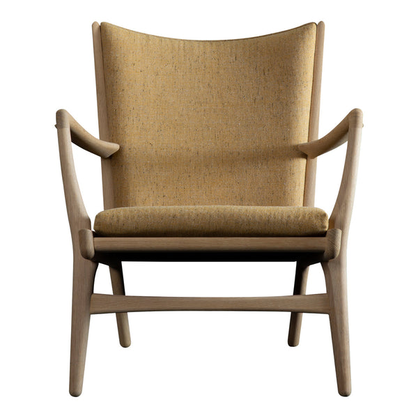 Stylish chair featuring a warm mustard yellow fabric and a minimalist wood frame in natural tones.