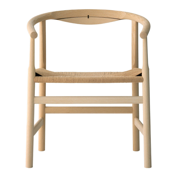 Natural wood chair with a light finish and woven seat, featuring a minimalist design and smooth curves.