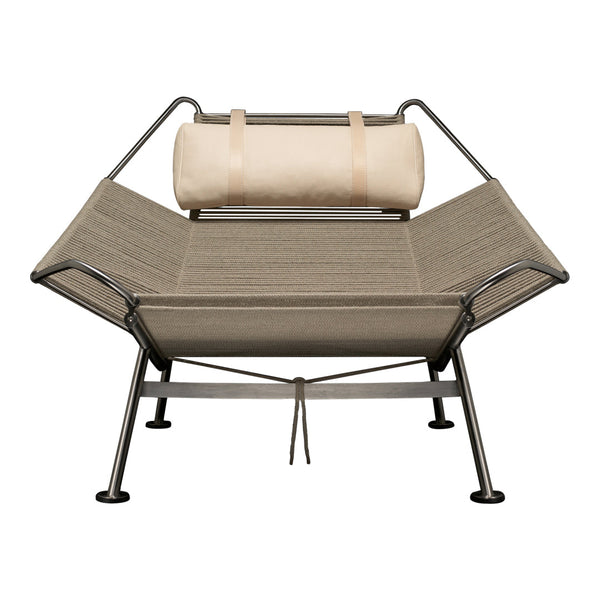 Light beige and light brown lounge chair with a sleek, minimalist design and a fabric headrest.