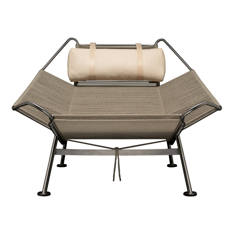 Light beige and light brown lounge chair with a sleek, minimalist design and a fabric headrest.