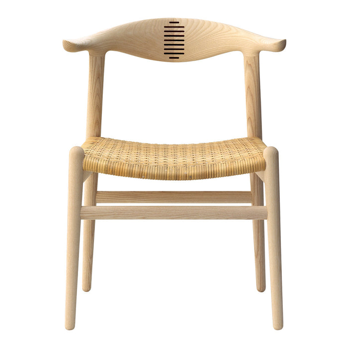 Natural wood chair with light beige woven seat, featuring a minimalist design and elegant curved backrest pattern.
