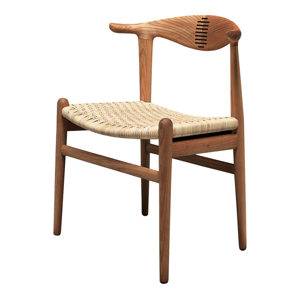 Natural wood chair with a light woven seat and subtle curved back, featuring a minimalist design and warm tones.