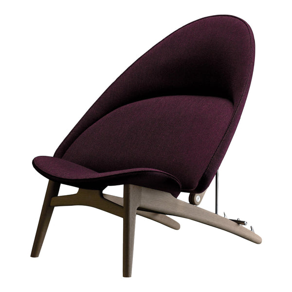 Stylish purple upholstered chair with a modern, curved design and natural wood base. Ideal for contemporary interiors.