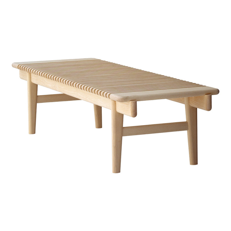 Light wood coffee table with slatted design and natural finish, showcasing a simple and modern aesthetic.