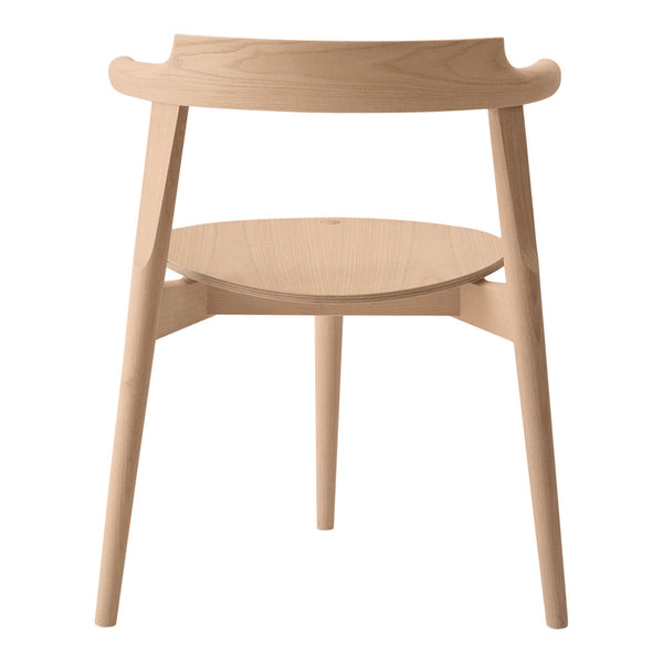 Minimalist wooden chair in light natural finish with smooth grain and simple design, showcasing an elegant, modern look.