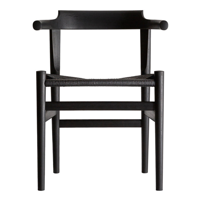 Black wooden chair with sleek, minimalist design and contrasting woven seat pattern. Perfect for modern decor.