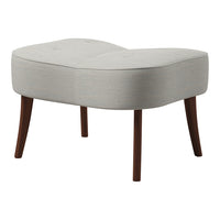 Light gray tufted ottoman with dark wooden legs, featuring a modern, soft curved design.