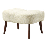 Cream-colored, textured ottoman with a soft, fluffy pattern and dark wooden legs, perfect for modern decor.