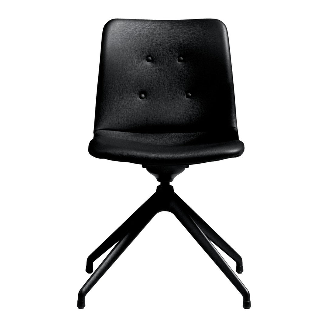 Black leather chair with button detailing and a metal base, featuring a sleek, minimalist design.