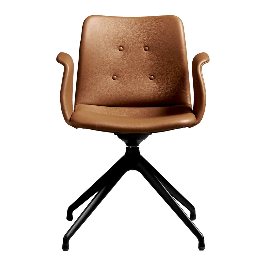 Brown upholstered chair with four-button detailing and a sleek black base, perfect for modern decor.