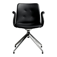 Black upholstered chair with buttoned detailing and sleek chrome base, perfect for modern decor.