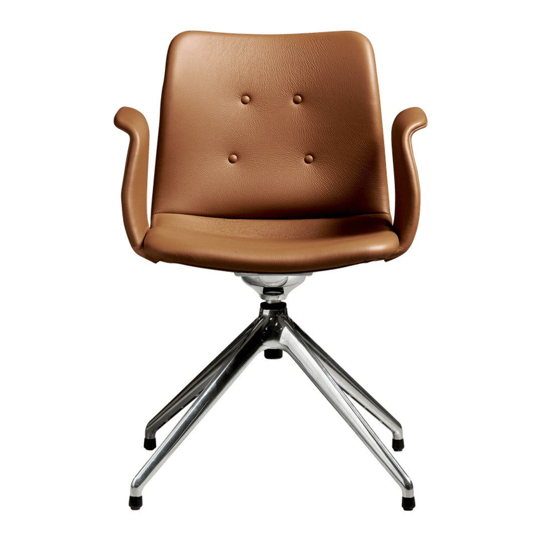 Brown leather chair with button detailing and a chrome base, featuring a sleek, modern design.