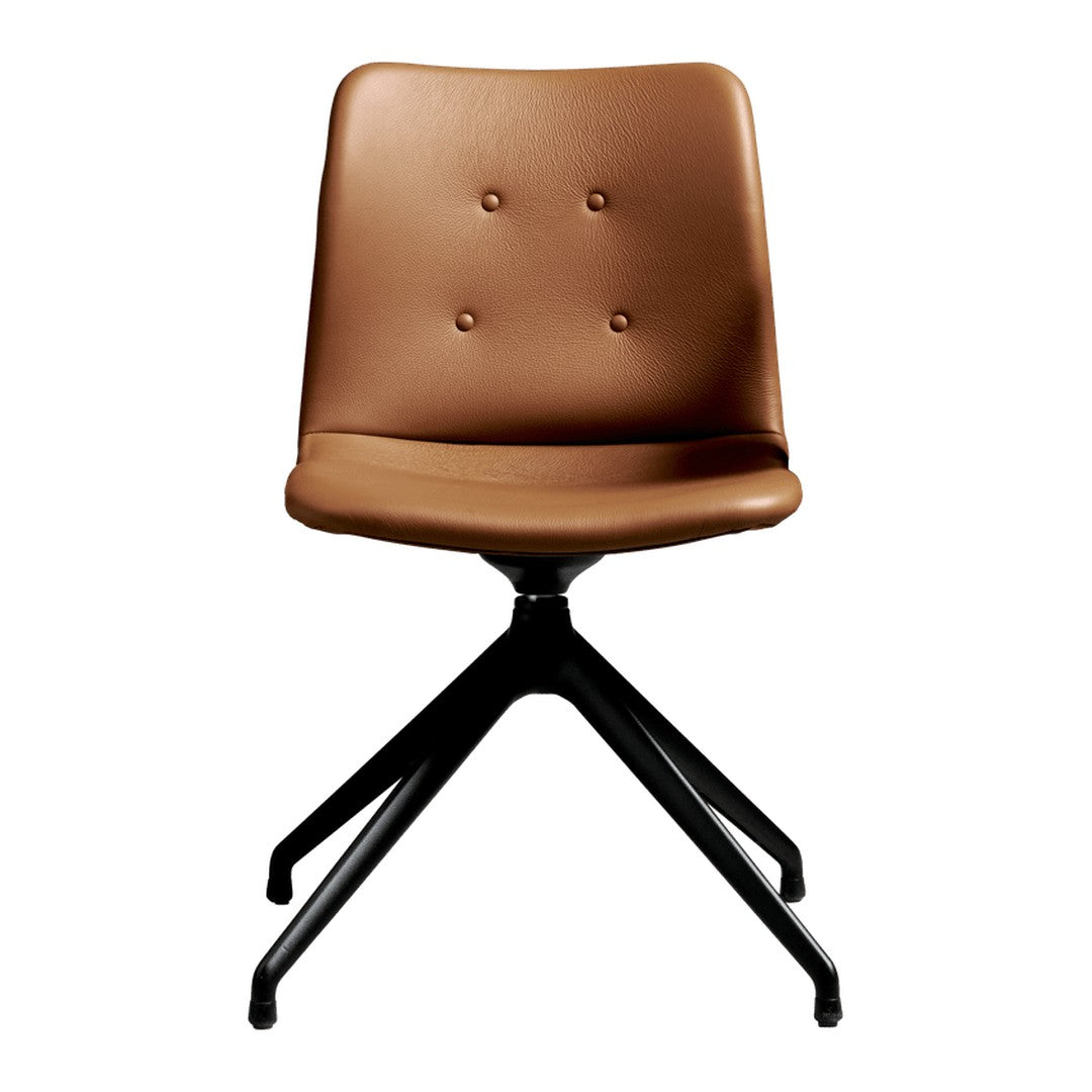 Brown leather chair with buttoned design and sleek black metal base, perfect for modern decor.