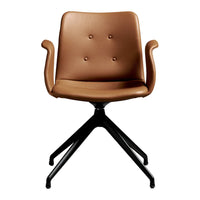 Tan leather upholstery with button detailing on a sleek black base. Modern design for stylish interiors.