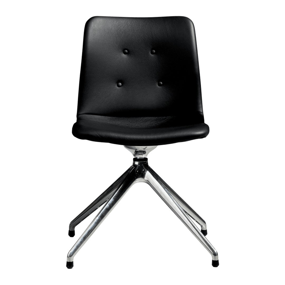 Black upholstered chair with button detailing and sleek chrome legs, featuring a modern minimalist design.