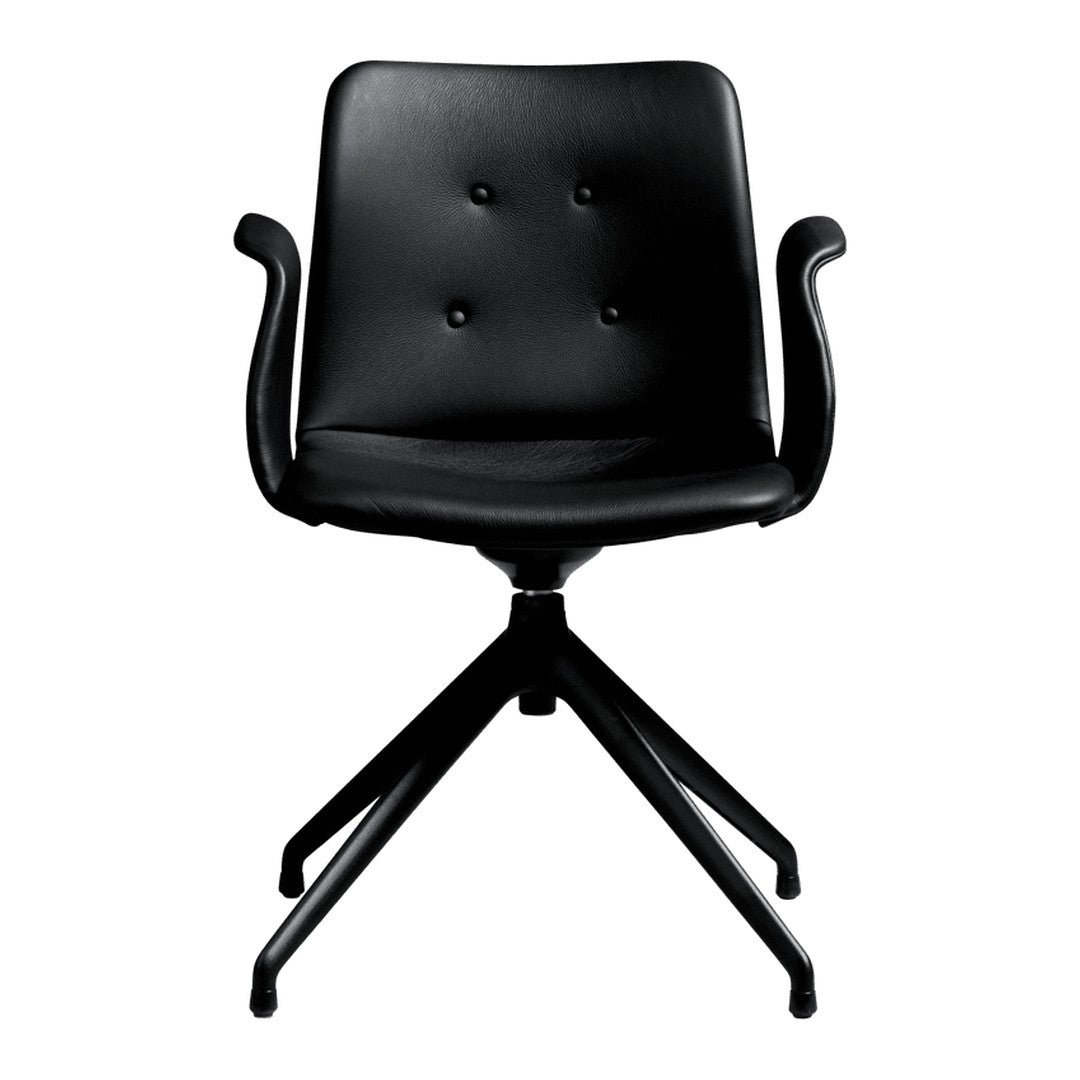 Black upholstered swivel chair with button tufting and sleek black metal base. Modern design with minimalist style.