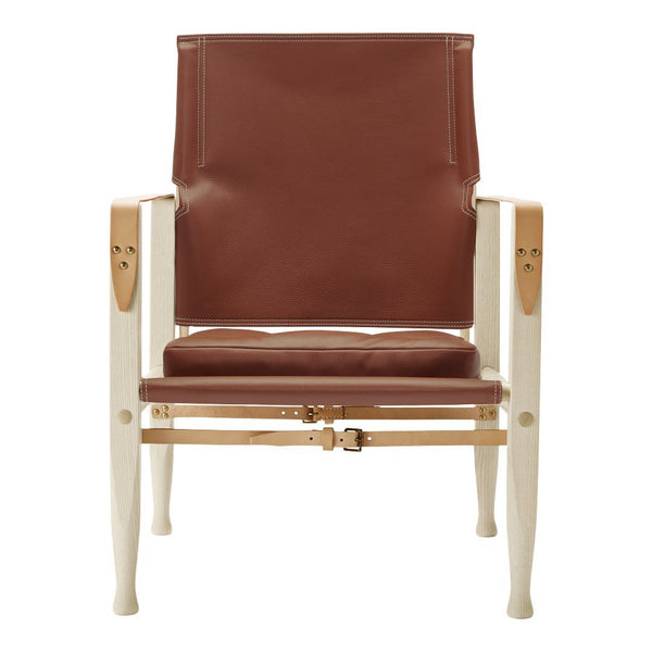 Brown leather chair with a smooth finish and light wooden frame. Simple, modern design with clean lines.