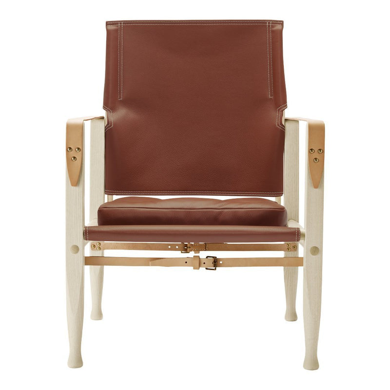 Brown leather chair with a smooth finish and light wooden frame. Simple, modern design with clean lines.