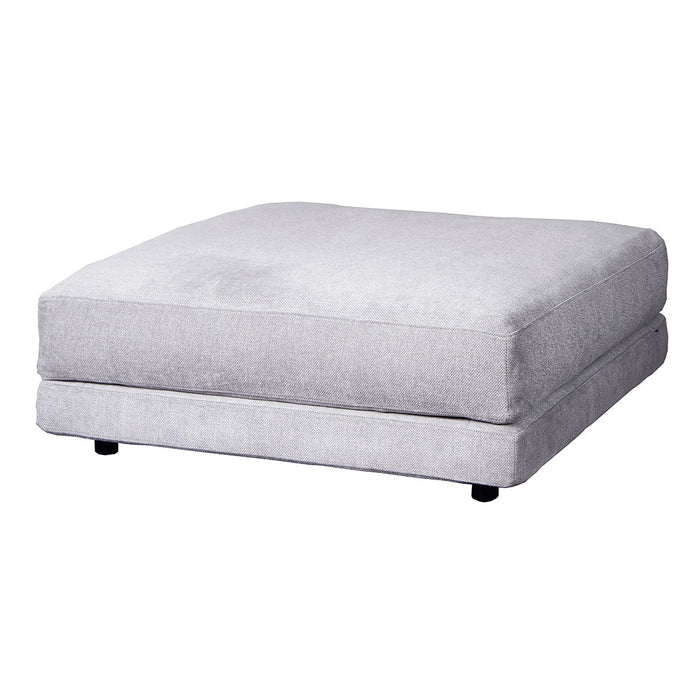 Soft gray square ottoman with a smooth fabric texture and minimalistic design, perfect for modern decor.