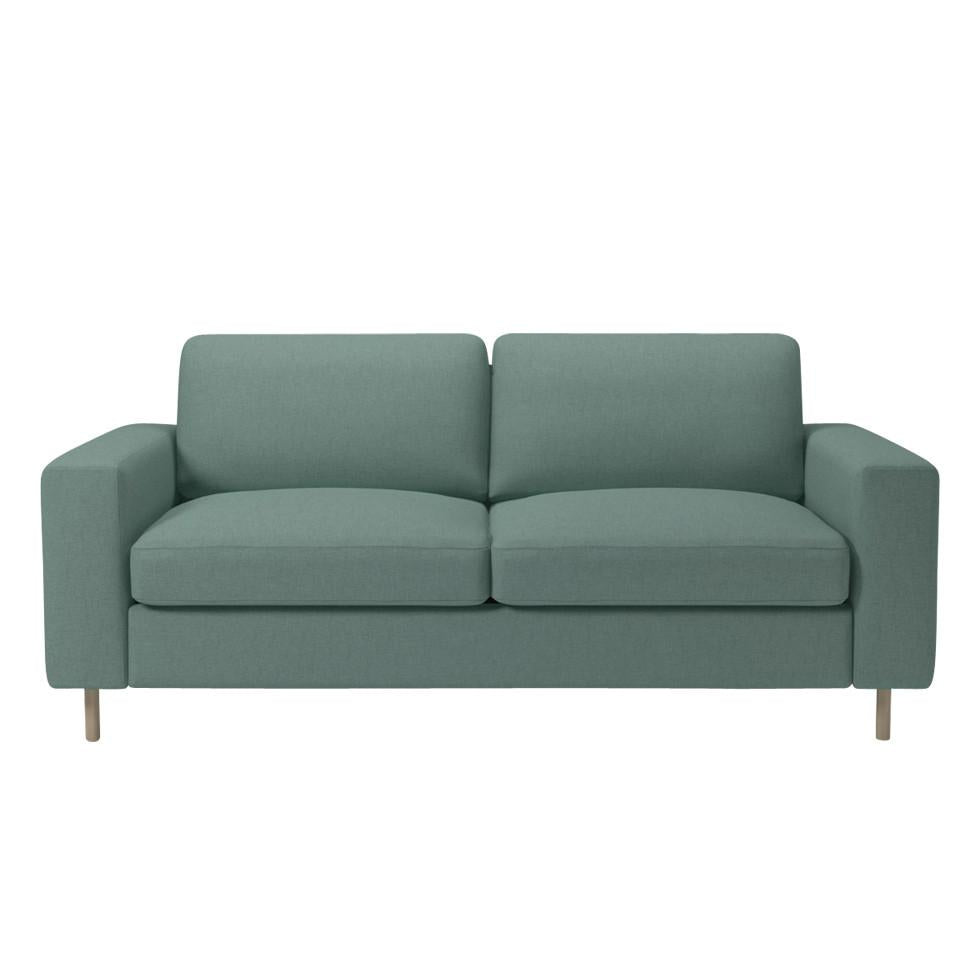 Teal upholstered loveseat with clean lines and a minimalist design, featuring solid wood legs.