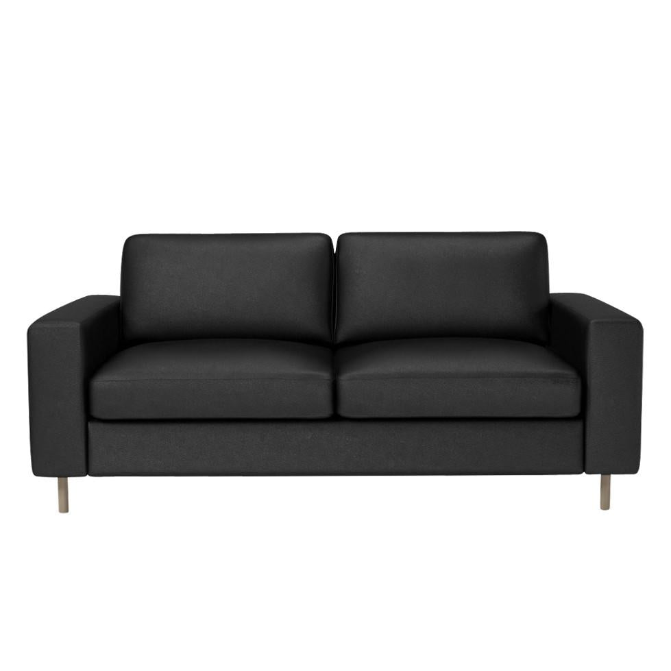 Modern black sofa with a sleek, minimalist design and smooth leather texture. Perfect for stylish living spaces.