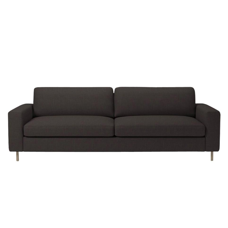 Modern dark gray sofa with sleek, minimalistic design and smooth fabric upholstery.