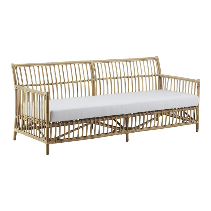 Natural rattan sofa with a white cushion. Features a sleek, minimalist design and open pattern for a modern look.