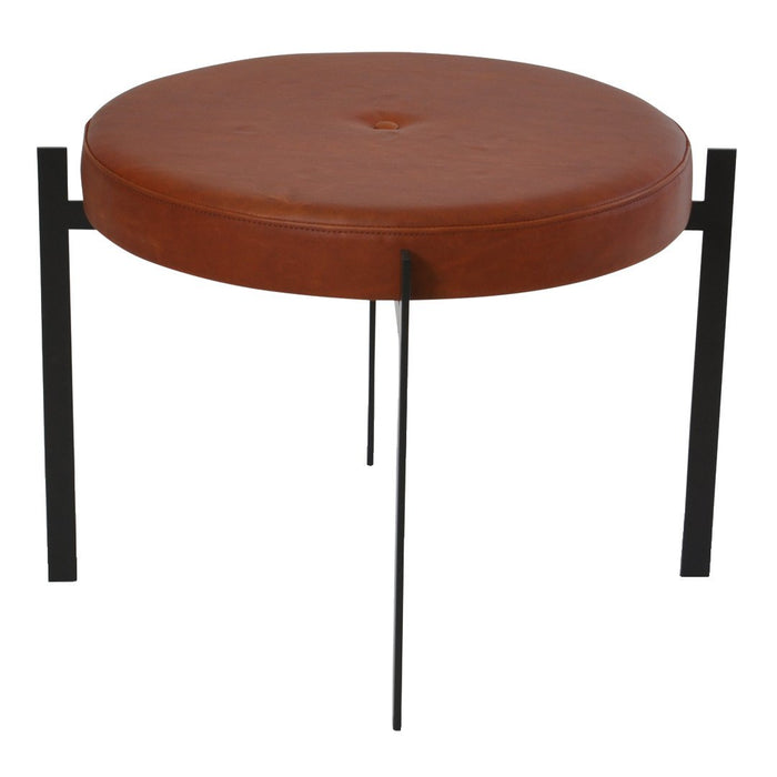 "Round brown leather stool with button detail and sleek black metal legs."