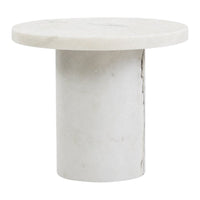 Round white marble side table with a smooth, polished finish and subtle veining patterns.