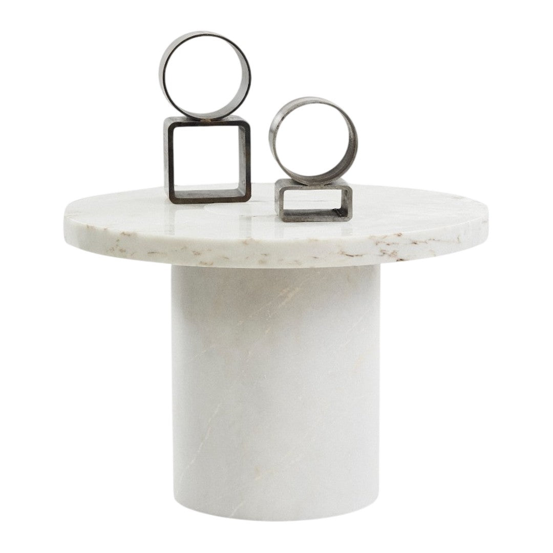 Marble side table with a smooth white finish, featuring geometric metallic accents in silver tones.
