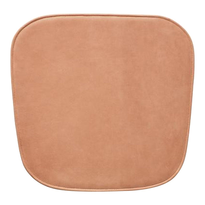 Soft, smooth, square cushion in warm tan with rounded edges, perfect for any modern decor.